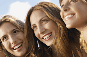 Three girls with beautiful smiles