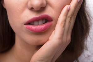 Woman Suffering From Tooth Pain