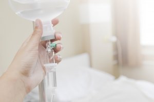 Close up saline IV drip for patient and Infusion pump in hospital