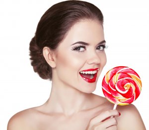 Attractive cheerful Woman with red lips makeup is smiling holdin
